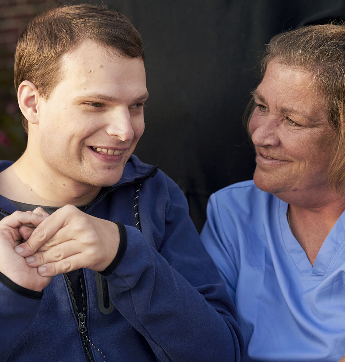 Steven in the pool with his parents